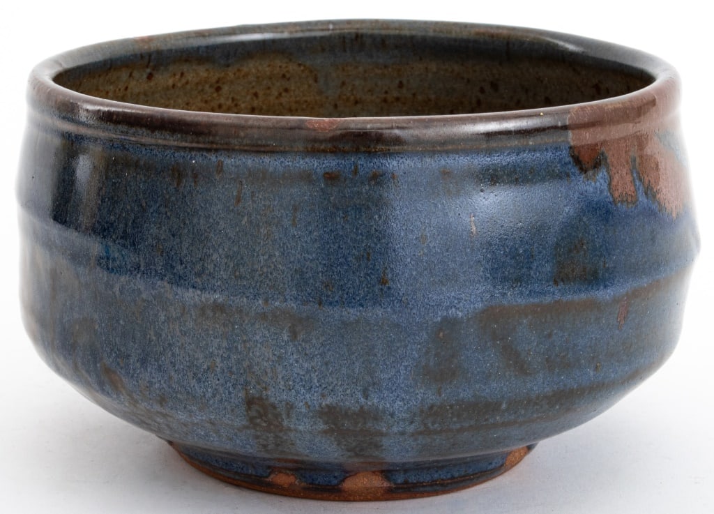 Warren MacKenzie Glazed Stoneware Bowl: Warren MacKenzie (American, 1924-2018) Glazed Stoneware Faceted Bowl, impressed with artists mark to underside. 4.5" H x 7.5" Diameter. Provenance: From a 333 East 75th Street Estate. Keywords: Vessel