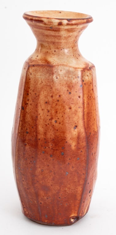 Warren MacKenzie Shino Glazed Stoneware Vase: Warren MacKenzie (American, 1924-2018) Shino Glazed Stoneware Tall Vase, impressed mark to underside. 12.75" H x 5.25" Diameter. Provenance: From a 333 East 75th Street Estate. Keywords: Ceramics, Cer