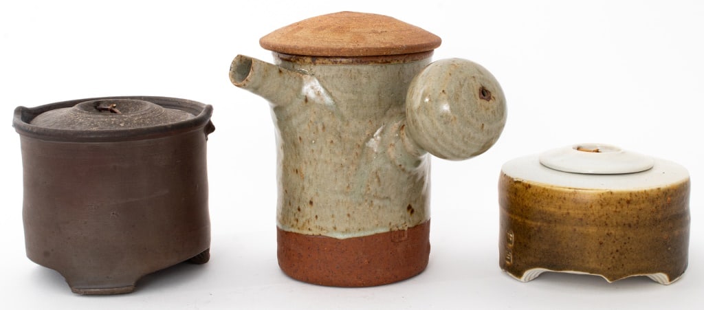 Byron Temple Art Pottery Vessels, 3: Three Byron Temple (American, 1933-2002) Art Pottery Vessels, comprising: stoneware coffee pot with lid in white glaze, stamped under handle, round covered pottery low box in white glaze, stamped to s