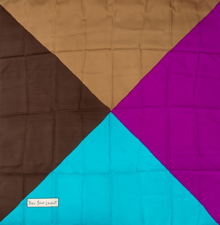 Yves Saint Laurent Silk Scarf: Yves Saint Laurent Silk Scarf, with color block motif, marked "Yves Saint Laurent" in print lower right. 32.5" L x 31.5" W. Provenance: From a New York City Collection. Keywords: Fashion, Garment, Acc
