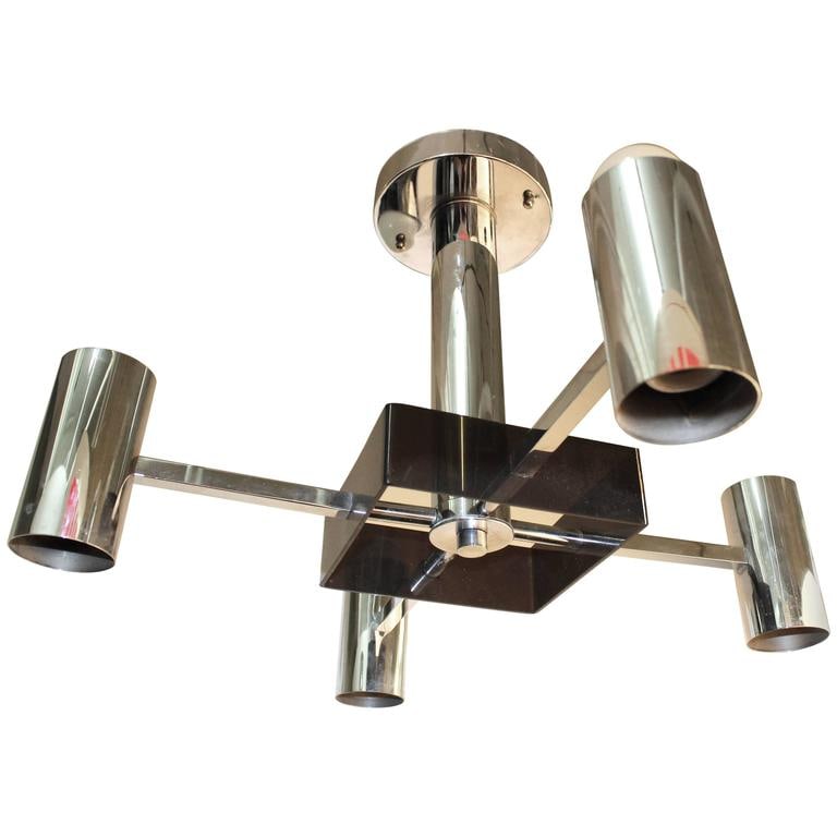 Mid-Century Modern Lucite & Chrome Chandelier: Mid-Century Modern Chrome Chandelier, with smoked Lucite details, in the manner of Gaetano Sciolari, includes the original porcelain sockets. 15.5" H x 16" D. Provenance: From a New York City Collecti
