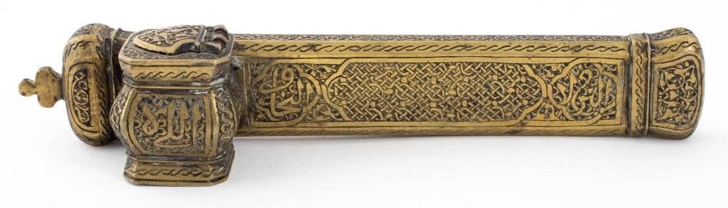 Ottoman Qalamdan Divit Travel Inkwell and Pen Case: Ottoman Empire Qalamdan Divit Travel Inkwell and Pen Case, 19th century, engraved with calligraphy, interlocking knots, and foliate designs. 1.75" H x 7.75" W x 2" W. Provenance: From a Sutton Place E