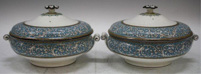 Lot of 2 Wedgwood Praze Turquoise Vegetable Pots: Set of two porcelain Wedgwood Praze vegetable or casserole pots or dishes with white ground and turquoise, gilt and black decoration, with removable lids that have black and white floral shaped finial