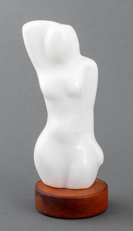 Joan Shapiro Nude Woman Alabaster Sculpture: Joan Hyde Shapiro (American, XX-XXI) Nude Woman Carved White Alabaster Sculpture, signed to reverse, mounted on a wood base. Overall: 10.25" H x 4" Diameter. Provenance: From the collection of the art