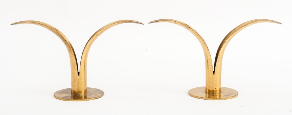 Ivar Bjork x Ystad-Metall Gilt Candlesticks, Pair: Pair of Ivar Alenius Bjork for Ystad-Metall Gilt Metal Lily Candlesticks, each marked "Made in Sweden" to underside. Each: 4.75" H x 8" W x 3" D. Provenance: From a New York City Collection. Keywords:
