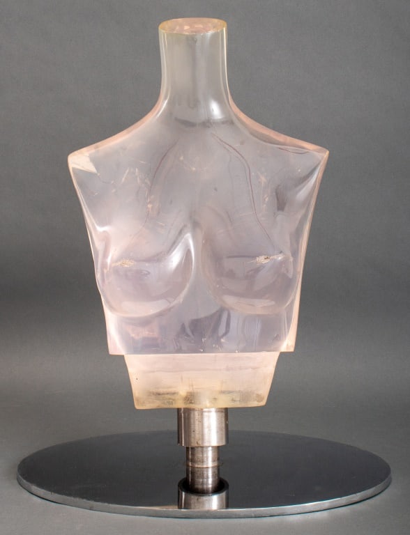 Female Bust Pink Lucite Sculpture, 1970s: Female Bust Pink Lucite Sculpture, 1970s, mounted on chrome stand. 26" H x 22" W x 14" D. Provenance: From a Manhattan Collector. Keywords: Statue, Figural, Figurative, Nude female, Female form, Disco