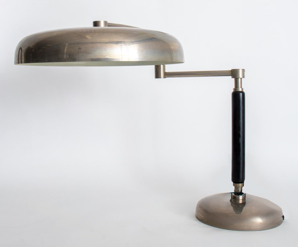 Alfred Muller "Quick 1500" Desk Lamp: Alfred Muller "Quick 1500" Desk Lamp, with metal shade and adjustable arm on steel base. 18.5" H x 15.5" Diameter. Provenance: From an Upper East Side York Avenue Estate. Keywords: Designer, Lighting,