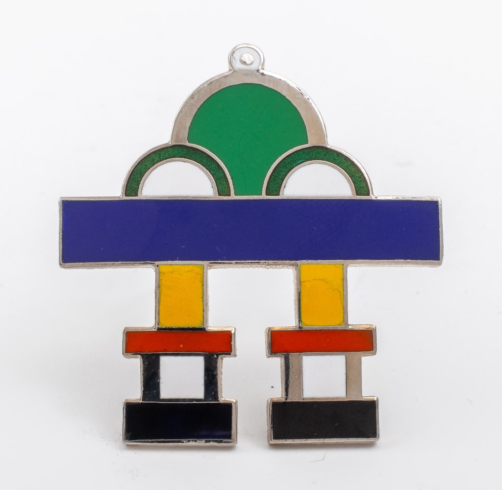 Ettore Sottsass For ACME "Trono" Brooch: Ettore Sottsass (Italian,1917-2007) for ACME Studios Memphis Silver-Tone "Trono" Brooch, 1986, with multicolored enamel design, marked "Sottsass / for ACME Studios" to reverse. 1.75" H x 1.75" W. Prov