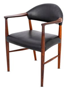 Kurt Olsen Model 223 Rosewood Armchair: Kurt Olsen Model 223 Rosewood Armchair, with black leather back and seat on four tapered legs, apparently unmarked. 30.5" H x 25" W x 17" D; seat: 18.25" H. Provenance: From a Central Park West Estate