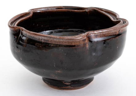 Warren MacKenzie Tenmoku Glazed Pinched Lip Bowl: Warren MacKenzie (American, 1924-2018) Tenmoku Glazed Stoneware Pinched Lip Bowl, impressed artist mark to underside. 4.75" H x 7.5" Diameter. Provenance: From 333 East 75th Street Estate. Keywords: V