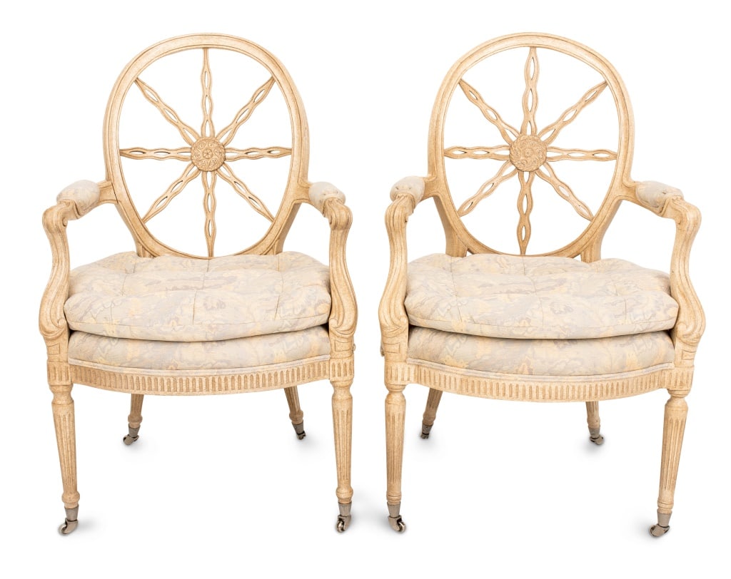 After Thomas Chippendale Upholstered Armchairs, 2: Pair of After Thomas Chippendale Wheel Back Upholstered Armchairs, on casters. 38.5" H x 23.5" W x 21.5" D; seat: 19" H; armrest: 26.5" H. Keywords: Furniture, Seating, Wheelback, Openwork, Sunburst,