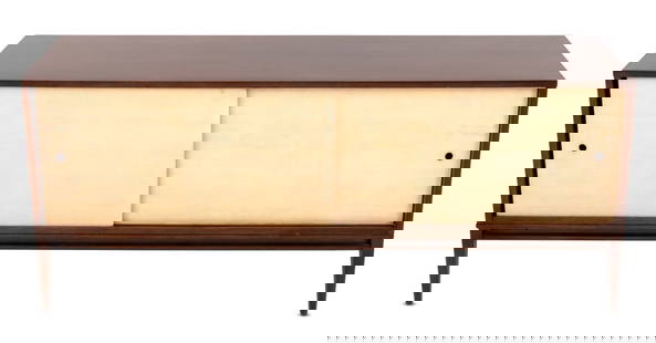 Paul McCobb x The Planner Group Mahogany Credenza: Paul McCobb for The Planner Group Mahogany Credenza, with two sliding cabinet doors on four tapered legs, with "The Planner Group / Designer by Paul McCobb / the Winchendon Furniture Company" label to