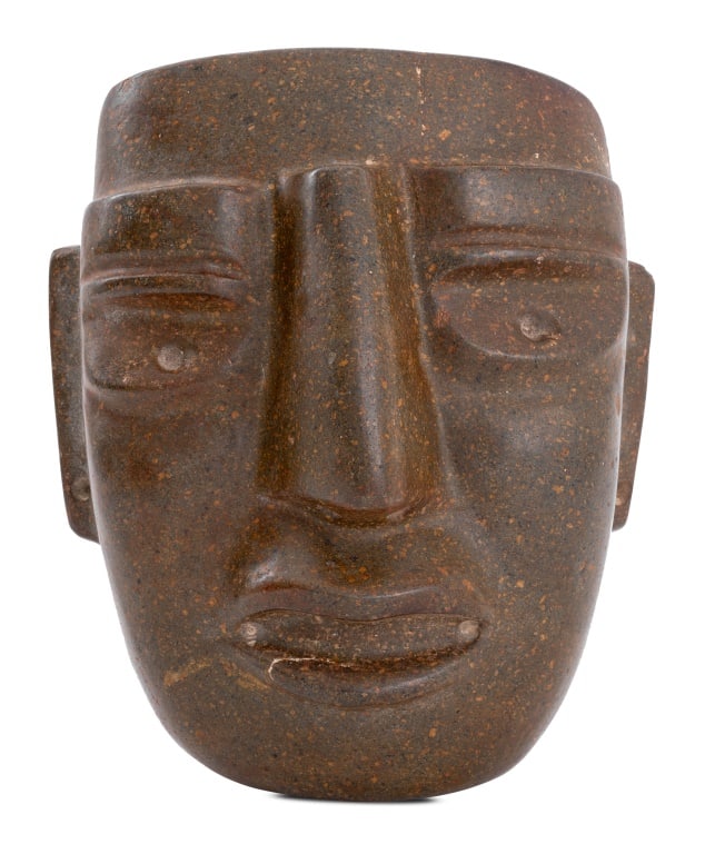 Olmec Pre-Columbian Style Carved Stone Mask: Olmec Pre-Columbian Style Carved Brown Stone Mask. 8.75" H x 7.5" W x 4" D. Provenance: From the Upper East Side Apartment of a Former Ambassador. Keywords: Mesoamerican Art, Mexican, Mexico, Carving,