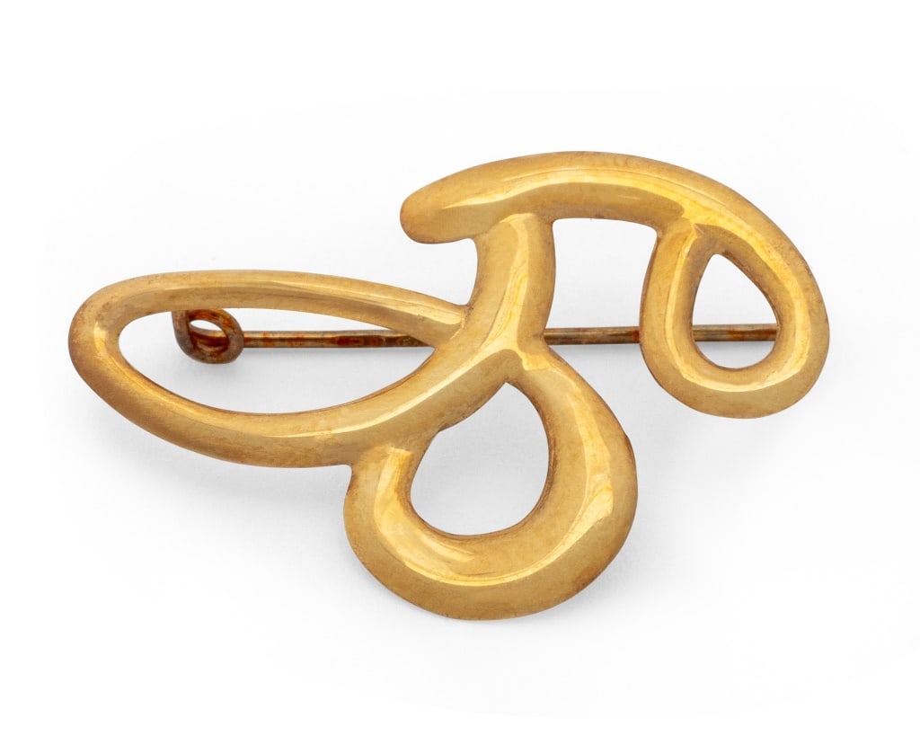 Italian 18K Yellow Gold Brooch: Italian 18K Yellow Gold Brooch, brightly polished, worn through fabric with pinstem and fixed "C"-catch, marked: "* 1368 VI 750". Measuring approx. 1 1/8" x 3/4", 0.6 dwt. Provenance: From a New York 