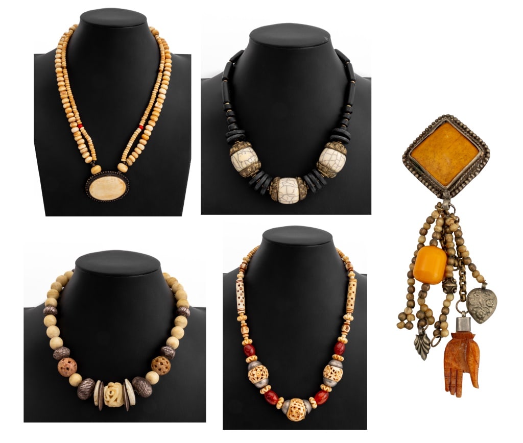 Tribal Carved Bone & Crystal Jewelry, 5: Group of Five Pieces of Tribal Carved Bone and Crystal Jewelry, comprising: three necklaces, one with carnelian and brass elements, one black resin beads, and one with silver beads and reticulated har