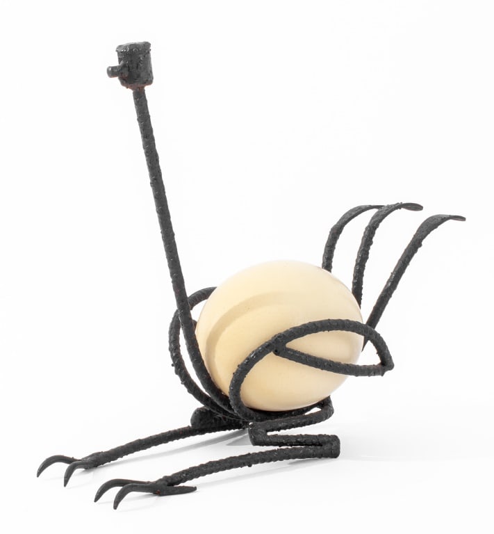 After Diego Giacometti Steel Ostrich Egg Sculpture: After Diego Giacometti (Swiss, 1902-1985) Patinated Steel Ostrich Egg Sculpture, apparently unsigned. 14" H x 14.5" W x 7.5" D. Provenance: From a Central Park South Estate. Keywords: Brutalism, Bruta
