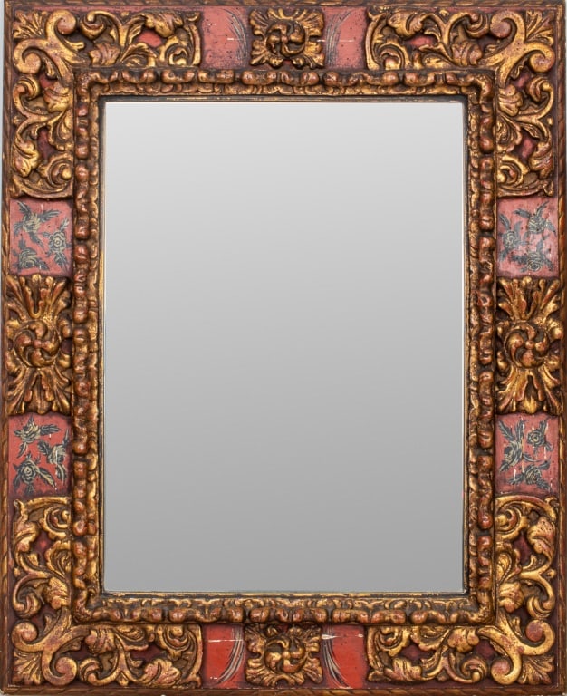 Southeast Asian Parcel Gilt Red Ground Mirror: Southeast Asian Parcel Gilded Red Ground Mirror, rectangular, the red ground with black and white peonies separated by lushly carved and gilded elements. 35" H x 25" W. Provenance: From a New York Cit