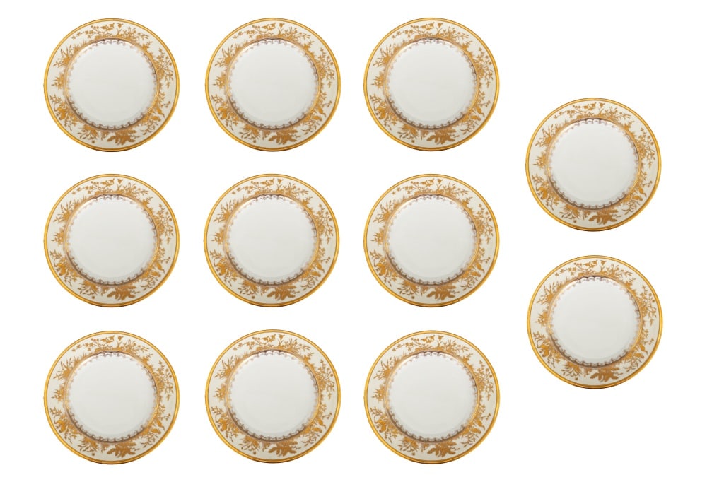 Pirkenhammer Gilt Decorated Porcelain Plates, 11: Set of Eleven Pirkenhammer Gilt Decorated Porcelain Dinner Plates, with foliate and bird design, each marked to underside with Pirkenhammer mark. 9.5" Diameter. Provenance: From a New York City Collec