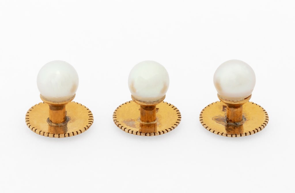 14K Yellow Gold Cultured Pearl Shirt Studs: Set of Three 14K Yellow Gold Cultured Pearl Shirt Studs, featuring three round cultured pearls approx. 6.0 - 6.5 mm, worn through shirt with fixed 14K yellow gold components and pearls facing up, mark