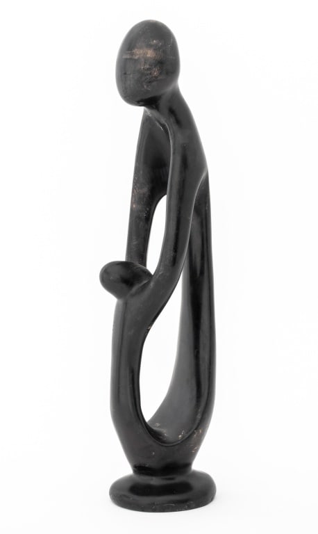 Kenyan Mother & Child Figural Stone Sculpture: Kenyan Mother and Child Figural Stone Sculpture. 12.5" H x 2.75" W x 3" D. Provenance: Property from the 5th Avenue residence of Jill and Ken Iscol. Keywords: African Arts, Besmo, Kenya, Carving, Stat