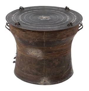 Southeast Asian Bronze Rain Drum: Southeast Asian Bronze Rain Drum, with sunburst and frog motif to top. 21" H x 24.5" Diameter. Provenance: From a 35 East 75th Street Estate. Keywords: Asian Arts, Metalwork, Bronzier, Musical Instrum