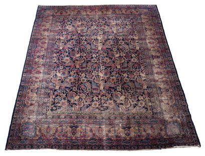 Signed Persian Kirman Carpet, 9' x 7' 2": Persian Kirman Wool Carpet, circa 1900, with all over floral pattern and geometric design, signed to top center. 9' L x 7' 2" W. Provenance: From a New York City Collection. Keywords: Rugs, Floor cove