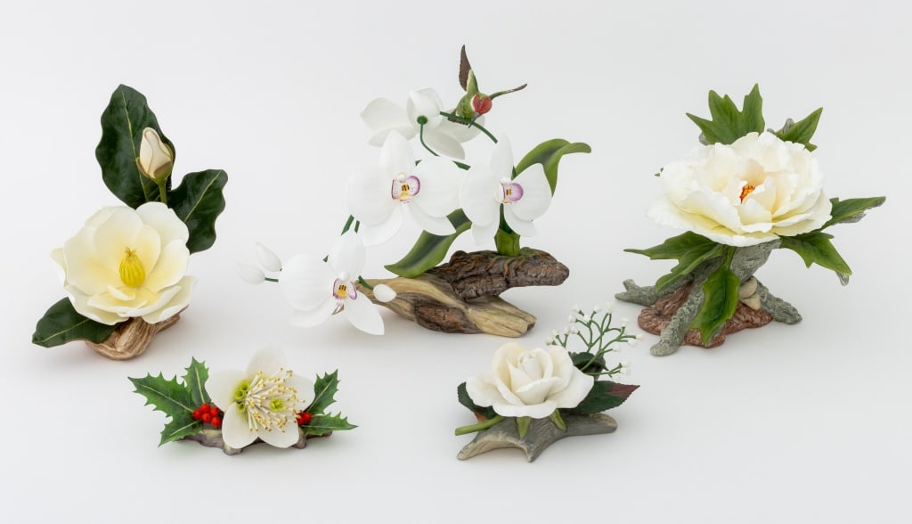 Boehm Porcelain Flower Arrangements, 5 Pcs.: Collection of Five Boehm Porcelain Flower Arrangements, comprising: "Anna's Hummingbird with Grazia Orchid", 1989, signed "Boehm" to the base and marked "Boehm / Made in U.S.A / Limited Issue / Anna's