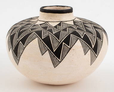 Grace Chino Acoma Pueblo Pottery Vase, 1987: Grace Chino (Acoma Pueblo, American, 1929-1994) Pottery Vase, 1987, with hand-painted angular geometric design, signed "ACOMA / NM / g. CHINO / 2-23-87" to underside. 5" H x 6.5" Diameter. Provenance: