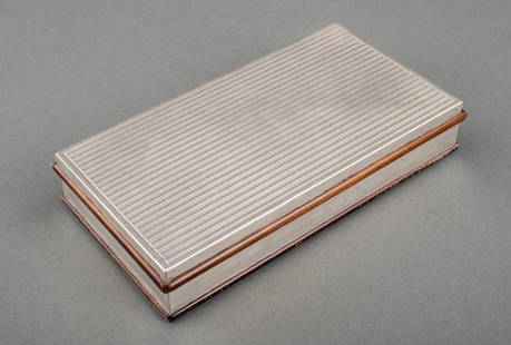 Italian Silver Mounted Ebony Box: Italian Silver Mounted Ebony Box, marked "FI" for Florence and "800". Silver not weighable. 1.75" H x 8.5" W x 4.5" D. Provenance: From a Manhattan Collector. Keywords: Covered box, European silver, M