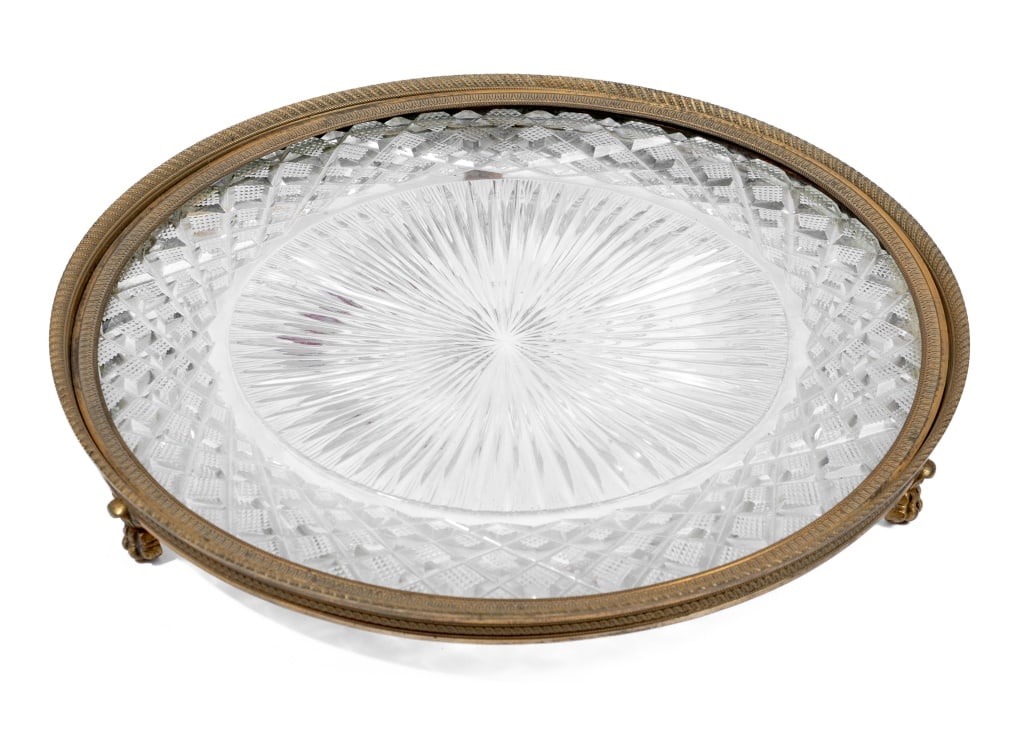 French Empire Style Gilt Brass Cut Glass Plateau: French Empire Style Gilt Brass and Cut Glass Circular Plateau, early 20th century. 1.75" H x 11.75" Diameter. Keywords: Glassware, Dinnerware, Tableware, Plates, Glass Stand, Centerpiece, Gilt metal,
