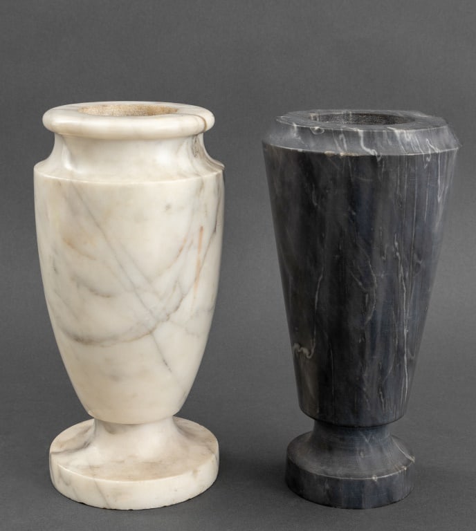 Marble Footed Vases, 2: Group of Two Marble Footed Vases, comprising: white Carrara marble and white veined gray marble. Larger: 10" H x 4.75" Diameter. Provenance: From an East 56th Street Estate. Keywords: Stone, Carving, 