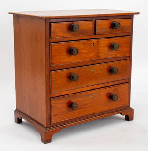 Victorian Miniature Mahogany Chest of Drawers: Victorian Miniature Mahogany Chest of Drawers, 19th century, with two short drawers over three frieze drawers with brass hardware. 14" H x 13.75" W x 8" D. Provenance: From a New York City Collection.