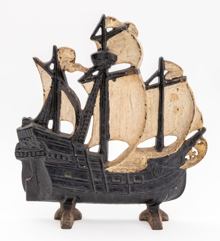 Three-Masted Ship Cast Iron Doorstop: Three-Masted Ship Cast Iron Doorstop, sails and flag painted white. 12" H x 11" W x 3.25" D. Provenance: From a New York City Collection. Keywords: Antique, Americana, Barque, Sailing Ship, Clipper, N