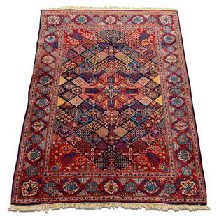 Persian Bakhtiari Rug, 6' 8" x 4' 8": Persian Bakhtiari Rug, navy blue and red patterns. 6' 8" L x 4' 8" W. Provenance: From a New York City Collection. Keywords: Area Rug, Rugs, Floor covering, Wool, Modern, Interior design, Textiles, De