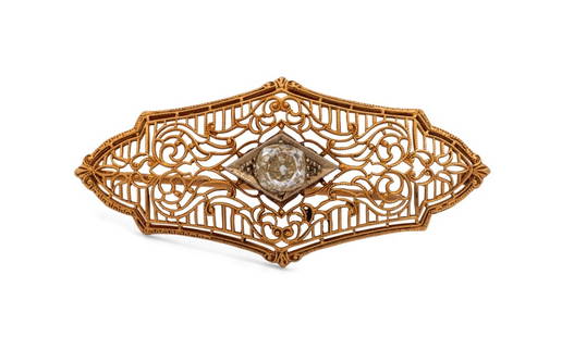 Art Deco 14K 2-Tone Gold Diamond Filigree Brooch: Late American Art Deco 14K White Gold and Yellow Gold Diamond Set Filigree Brooch, worn on cloth through pin set and hook catch, marked: "14K" with maker's mark. 1 7/8" x 7/8" approx.; depth: 7.00 mm