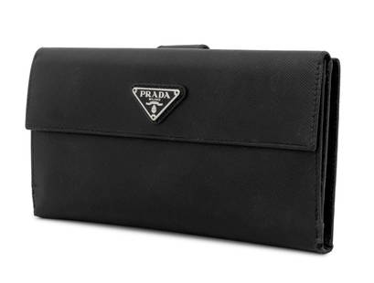 Prada Black Saffiano Leather Wallet: Prada Black Saffiano Leather Wallet, "Prada / Milano" silver-tone metal plaque to front closure and opposite side openening to four pockets and 13 credit card slots, impressed mark "Prada / Milano / M