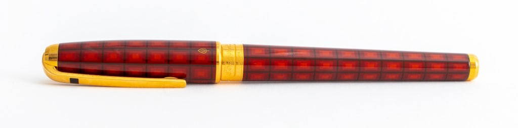 S.T. Dupont 18K Gold Nib Lacquered Fountain Pen: S.T. Dupont 18K Yellow Gold Nib and Lacquered Fountain Pen, gilt cap and barrel with geometric red lacquer motif, the medium nib stamped 18K, marked "ST Dupont Paris - Made in France", serial number "