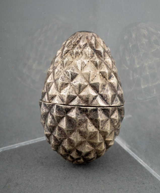 Tiffany & Co. Sterling Silver Pinecone Form Box: Tiffany and Company Sterling Silver Pinecone Form Pill Box, struck "Sterling / Tiffany & Co." to gold-washed interior. Weight: 0.82 ozt.; 1.5" H x 1" Diameter. Provenance: From a Manhattan collector.