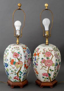 Chinese Porcelain Ginger Jar Mounted Lamps, Pair: Pair of Chinese Porcelain Ginger Jars Mounted as Lamps, allover decorated with chrysanthemum motifs in the Famille Rose palette, on wooden bases. 29" H x 8" W x 8" D. Provenance: From a New York City