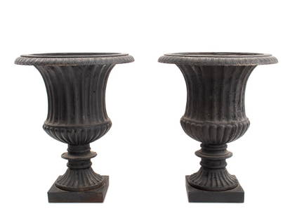 Neoclassical Cast Iron Urn Jardinieres, Pair: Pair of Neoclassical Cast Iron Urn Jardinieres, fluted sides. 14" H x 11.5" Diameter. Provenance: From a New York City Collection. Keywords: Planter, Sculpture, Garden, Outdoor planter, Interior desig
