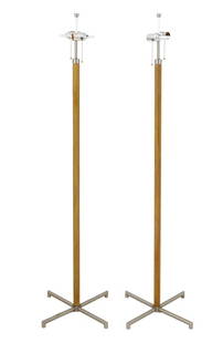 Modern Leather Wrapped Aluminum Floor Lamps, Pair: Pair of Mid-Century Modern Leather Wrapped Aluminum Floor Lamps, each on four feet. 55" H x 17" W x 17" D. Provenance: From a Sutton Place Estate. Keywords: Lighting, Standing lamp, Accent lamp, Moder
