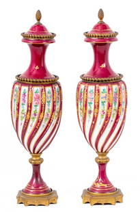 Sevres Rose du Barry Vases, Pair: Pair of Sevres Rose du Barry Gilt Metal Mounted Vases, late 19th century, each with a domed top and wyrthen body painted with floral sprays and elaborate gilt borders on a socle and gilt metal base, s