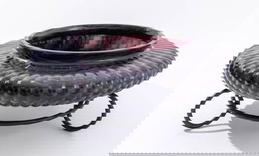 Studio Art Violet Agate Glass Vase on Stand: Studio Art Violet Agate Glass Ribbed Vase on Stand, ribbed vase, banded milk amethyst glass on a wrought iron base. 8" H x 18" Diameter. Provenance: From a New York City Collection. Keywords: Art Glas