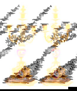 French Gilt Metal & Pink Porcelain Candelabra, Pr.: Pair of French Gilt Metal and Pink Porcelain Four-Branch Candelabra, each painted with playful figures of cupid and oval portraits of noble women, on giltwood plinths. 21" H x 9" W x 8" D. Keywords: L