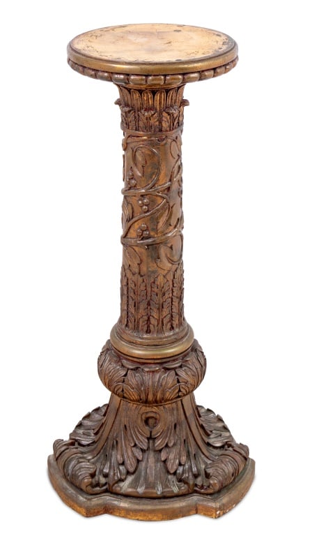 Victorian Style Carved Giltwood Pedestal: Victorian Style Carved Giltwood Pedestal, 20th century, the circular top above a tapering column, richly carved with acanthus leaves and grape vines, on a tripartite plinth. 37.5" H x 18" W x 18" D. K