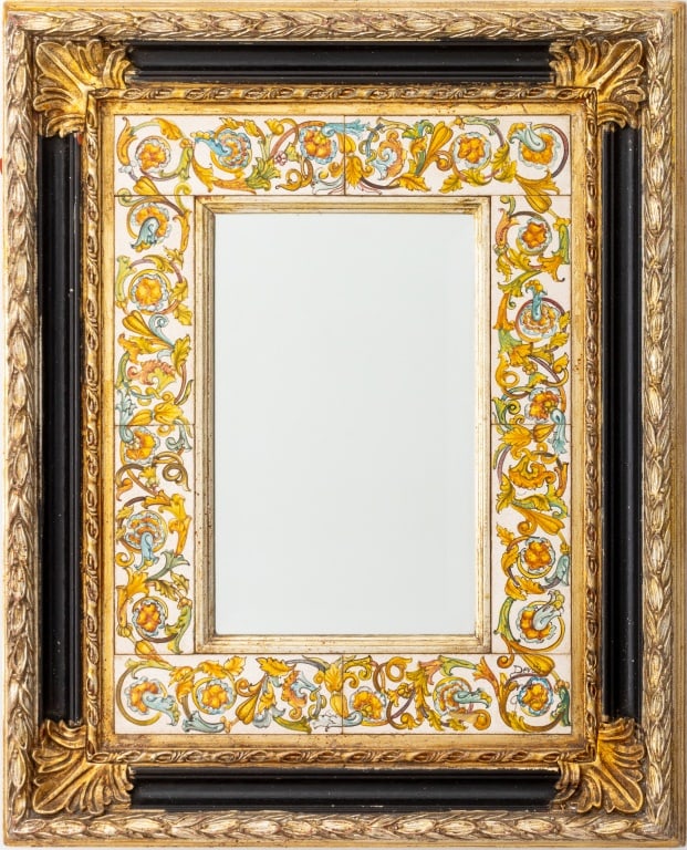 Italian Renaissance Style Polychromed Mirror: Rectangular Italian Renaissance Style Polychromed Mirror, with silvered berried leaf borders and an interior panel painted with grotesques, the glass beveled. 28" H x 23" W. Provenance: From a New Yor