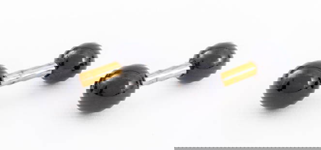 Tiffany & Co. 14K Yellow Gold Black Onyx Cufflinks: Pair of Tiffany and Company 14K Yellow Gold Black Onyx Barbell Cufflinks, featuring 4 black onyx beads, approx. 8.5 - 10.0 mm., worn as slip through cuff holes with fixed ends, marked: "TIFFANY 14K".