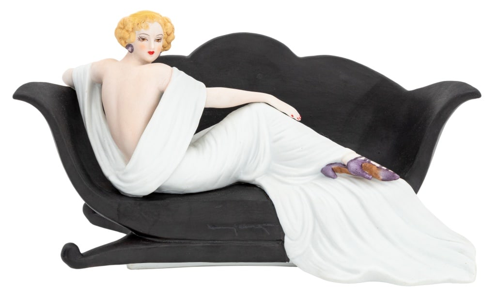 "Le Sofa" Louis Icart Porcelain Figurine, 1984: "Le Sofa" Louis Icart Porcelain Figurine, 1984, marked "Exclusively Distributed by / The Heirloom Tradition / Icart Figurine / 1937 Le Sofa" and "(c) 1984 DACS/Spadem / Le Sofa by Louis Icart 1937 / A