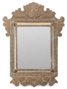 Aesthetic Movement Embossed Brass Cushion Mirror: Aesthetic Movement Embossed Brass Cushion Mirror. 35" H x 25.25" W x 2.25" D. Provenance: From a New York City Collection. Keywords: Looking glass, Vanity, Antique, Interior decor, Decorative Arts