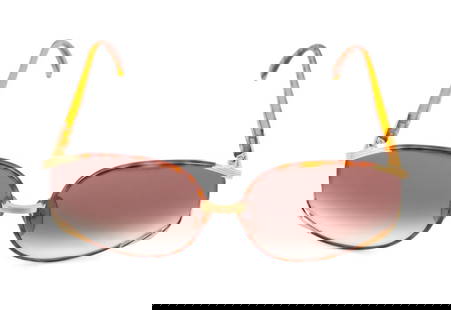 Christian Dior Butterfly Sunglasses: Christian Dior Butterfly Sunglasses, in faux tortoiseshell and gold tone label "Christian Dior" to right temple and "Made in Austria" to left temple.2.5" H x 5.75" W x 5.25" D. Provenance: From a New
